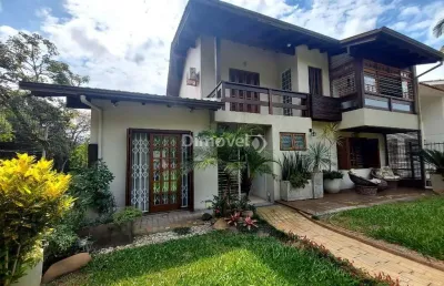 Casa com 3 quartos à venda na rua olécio cavedini, 235, ipanema, porto alegre por r$ 790.000