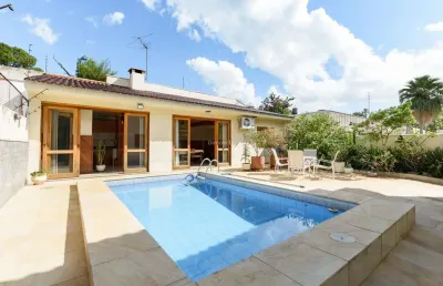 Casa com 5 quartos à venda na avenida pereira passos, 239, vila assunção, porto alegre por r$ 2.320.000