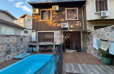 Casa com 3 quartos à venda na rua décio pelegrini, 21, ipanema, porto alegre por r$ 600.000
