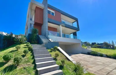 Casa em condomínio fechado com 4 quartos à venda na estrada das três meninas, 1400, vila nova, porto alegre por r$ 2.300.000