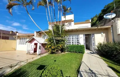 Casa com 4 quartos à venda na rua general rondon, 1671, tristeza, porto alegre por r$ 850.000
