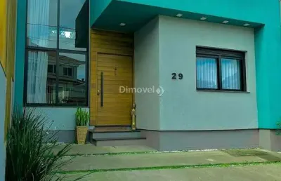 Casa em condomínio fechado com 3 quartos à venda na rua carlos maximiliano fayet, 430, hípica, porto alegre por r$ 739.000