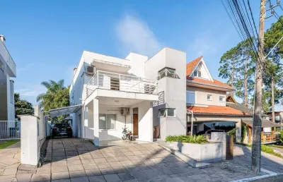 Casa em condomínio fechado com 3 quartos à venda na avenida edgar pires de castro, 540, aberta dos morros, porto alegre por r$ 1.000.000