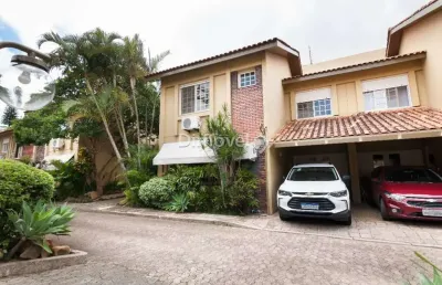 Casa em condomínio fechado com 3 quartos à venda na rua doutor armando barbedo, 832, tristeza, porto alegre por r$ 850.000