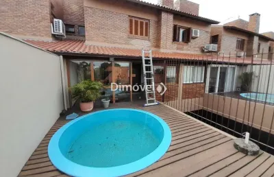 Casa em condomínio fechado com 3 quartos à venda na rua doutor david de azevedo gusmão, 185, jardim isabel, porto alegre por r$ 1.060.000