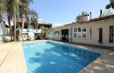 Casa com 4 quartos à venda na travessa pedra redonda, 130, jardim isabel, porto alegre por r$ 1.950.000