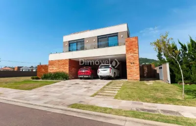 Casa em condomínio fechado com 4 quartos à venda na estrada das três meninas, 1400, vila nova, porto alegre por r$ 3.600.000