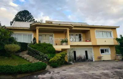Casa com 4 quartos à venda na rua morro alto, 155, campo novo, porto alegre por r$ 850.000