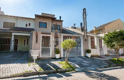 Casa com 3 quartos à venda na rua norival paranaguá de andrade, 41, hípica, porto alegre por r$ 585.000