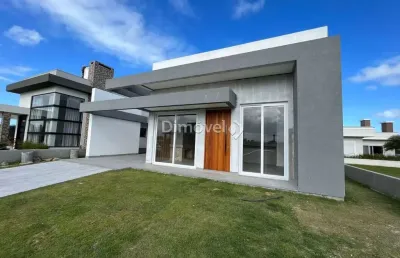 Casa em condomínio fechado com 3 quartos à venda na honorio germano, 2009, centro, capão da canoa por r$ 1.190.000
