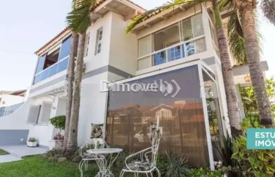 Casa com 4 quartos à venda na rua adão pinheiro da silva, 140, ipanema, porto alegre por r$ 950.000