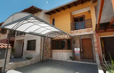 Casa em condomínio fechado com 2 quartos à venda na avenida edgar pires de castro, 1286, hípica, porto alegre por r$ 370.000