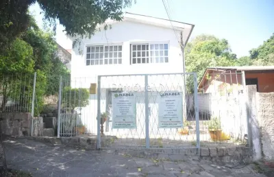 Casa com 3 quartos à venda na rua liberal, 1115, tristeza, porto alegre por r$ 450.000