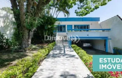 Casa com 4 quartos à venda na avenida pereira passos, 316, vila assunção, porto alegre por r$ 1.475.000