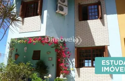 Casa com 3 quartos à venda na rua dos guananas, 63, espírito santo, porto alegre por r$ 650.000