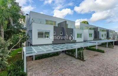 Casa em condomínio fechado com 3 quartos à venda na rua doutor ney de castilhos ferreira, 300, pedra redonda, porto alegre por r$ 2.750.000