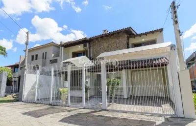 Casa com 4 quartos à venda na rua adão pinheiro da silva, 420, ipanema, porto alegre por r$ 1.190.000