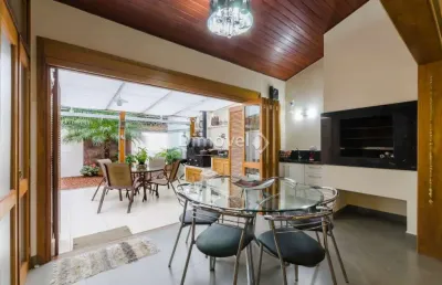Casa com 3 quartos à venda na rua almirante mariath, 190, tristeza, porto alegre por r$ 1.400.000