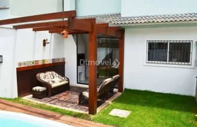 Casa em condomínio fechado com 3 quartos à venda na rua corticeira, 754, hípica, porto alegre por r$ 730.000