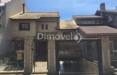Casa com 4 quartos à venda na rua lloyd de andrade polidoro, 60, ipanema, porto alegre por r$ 1.060.000