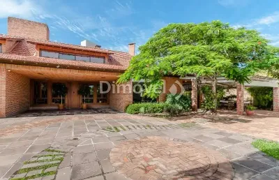 Casa com 5 quartos à venda na rua landel de moura, 167, tristeza, porto alegre por r$ 4.200.000
