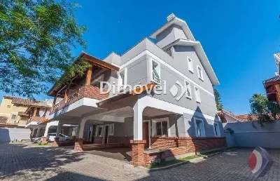 Casa em condomínio fechado com 3 quartos à venda na rua general rondon, 59, vila assunção, porto alegre por r$ 1.950.000