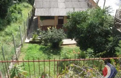Casa com 2 quartos à venda na rua general rondon, 1306, tristeza, porto alegre por r$ 640.000