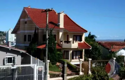 Casa com 4 quartos à venda na rua chiriguano, 227, vila assunção, porto alegre por r$ 1.650.000