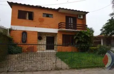 Casa com 3 quartos à venda na rua jacundá, 670, guarujá, porto alegre por r$ 570.000
