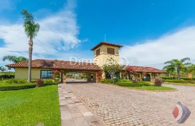 Terreno em condomínio fechado à venda na avenida juca batista, 8000, belém novo, porto alegre por r$ 420.000