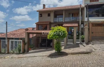 Casa com 3 quartos à venda na rua inês vinhas, 45, espírito santo, porto alegre por r$ 1.090.000