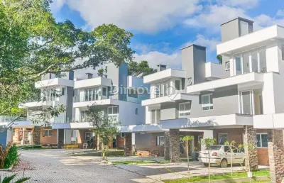Casa em condomínio fechado com 4 quartos para alugar na avenida coronel marcos, 1239, pedra redonda, porto alegre por r$ 19.000