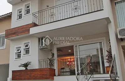 Casa em condomínio fechado com 4 quartos à venda na Rua Deputado Hugo Mardini, 1780, Passo das Pedras, Porto Alegre