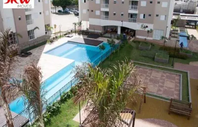 Apartamento com 2 quartos sendo um suíte ,cozinha com armários planejados, sala de jantar e estar, banheiro social, área de serviço com armário.