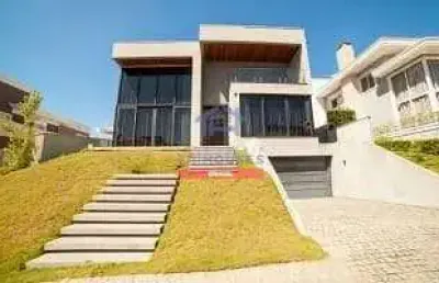 Maravilhosa casa em condomínio com 4 dormitórios , 4 suítes e ofurô em condomínio fechado à venda n