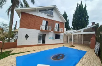 Sobrado em condomínio com 4 suítes sendo uma suíte no térreo 4 vagas com piscina privativa a venda no são braz
