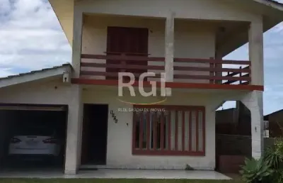 Casa em condomínio fechado com 3 quartos à venda na joao de magalhaes, 1024, zona nova sul, tramandaí por r$ 426.000
