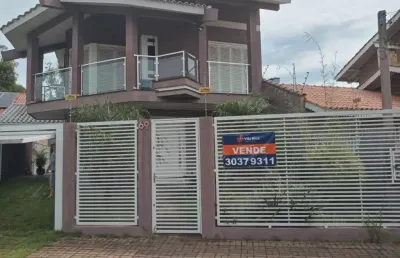 Casa com 4 quartos à venda na das nacoes, 69, centro, esteio por r$ 1.500.000