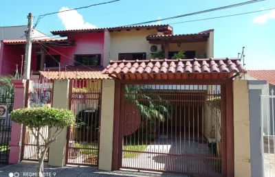 Casa com 3 quartos à venda na rua germano arduíno toniolo, 49, parque amador, esteio por r$ 590.000