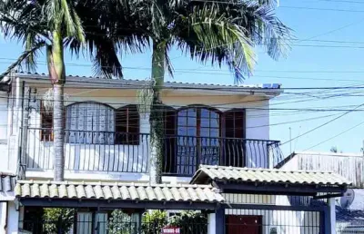 Casa com 3 quartos à venda na rua rosinha joaquina da silveira, 295, vargas, sapucaia do sul por r$ 532.000