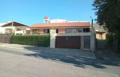 Casa com 4 quartos à venda na rua vila lobos, 245, parque tamandaré, esteio por r$ 650.000