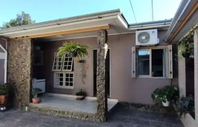 Casa com 3 quartos à venda na argemiro ribeiro moreira, 32, nova sapucaia, sapucaia do sul por r$ 398.000