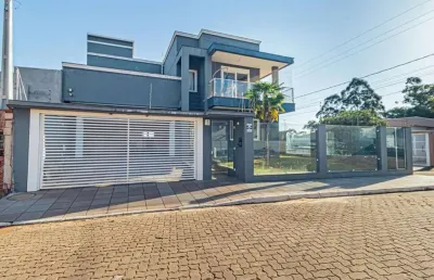 Casa com 4 quartos à venda na rua euclides correa machado, 340, vargas, sapucaia do sul por r$ 1.590.000