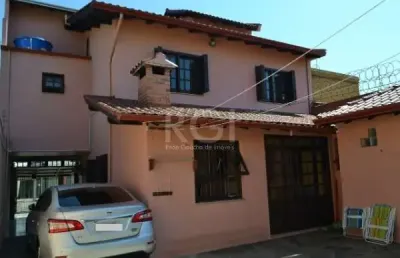 Casa com 4 quartos à venda na rua alagoas, 184, paraíso, sapucaia do sul por r$ 790.000