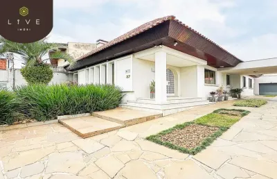 Casa com 3 quartos à venda na rua ernesto de araújo, 37, jardim botânico, curitiba, 270 m2 por r$ 1.260.000