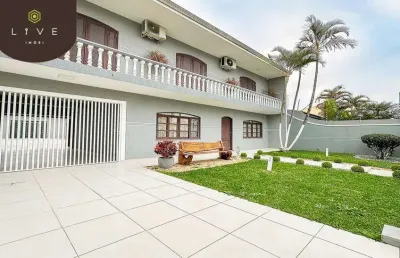 Casa com 4 quartos à venda na rua câmara júnior, 906, jardim das américas, curitiba, 245 m2 por r$ 1.690.000