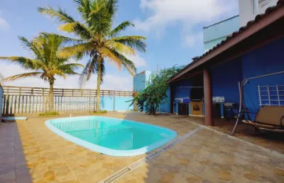 Casa no condomínio ipanema itanhaem com piscina e vista para o mar
