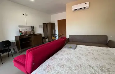 Home studio com uma suíte,sala,varanda gourmet,cozinha e lavanderia.