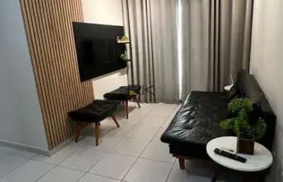 Apartamento praia grande com 2 dormitórios sendo 1 suíte,1 vaga de garagem,varanda gourmet com churrasqueira