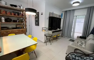 Apartamento praia grande com 2 dormitórios sendo 1 suíte,1 vaga de garagem,sala 2 ambientes,varanda gourmet com churrasqueira